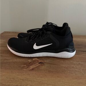 Women’s black Nike Tennis Shoes sneakers